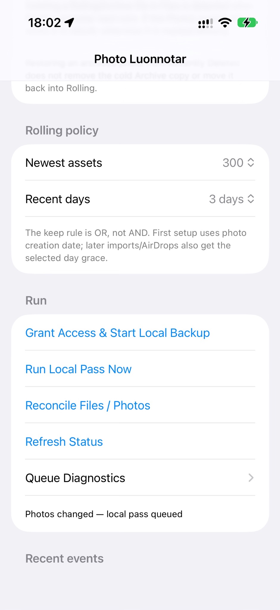 Photo Luonnotar on iPhone showing Rolling policy and local backup controls.