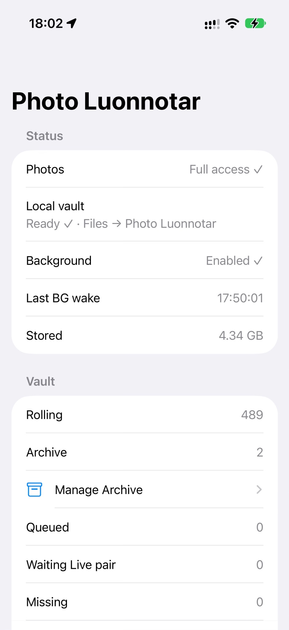Photo Luonnotar on iPhone showing Photos access, local vault state, background status, Rolling and Archive counts.